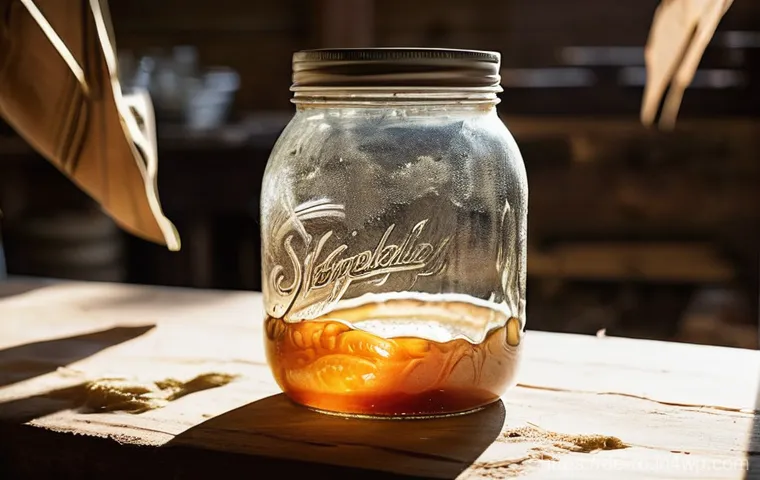 콤부차 가죽의 패션 트렌드 예측 - **Prompt:** A close-up, dynamic shot of a large, clear glass fermentation jar in a warmly lit, rusti...